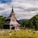 A cemetery surrounding the wooden Kaupanger Stave church in Norway